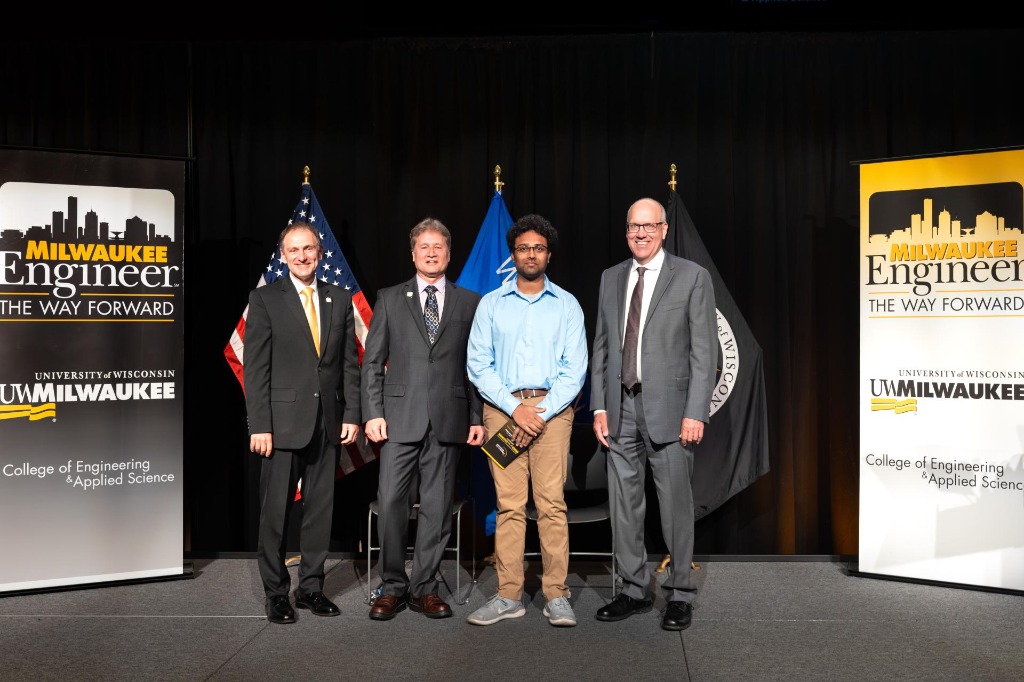 Phani receiving the UWM Best Capstone Project Award